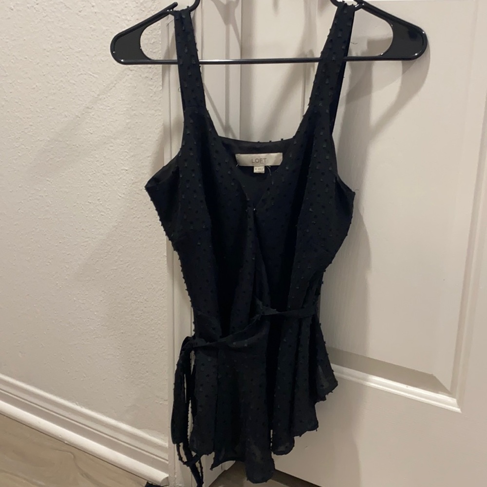 Black peplum shell top